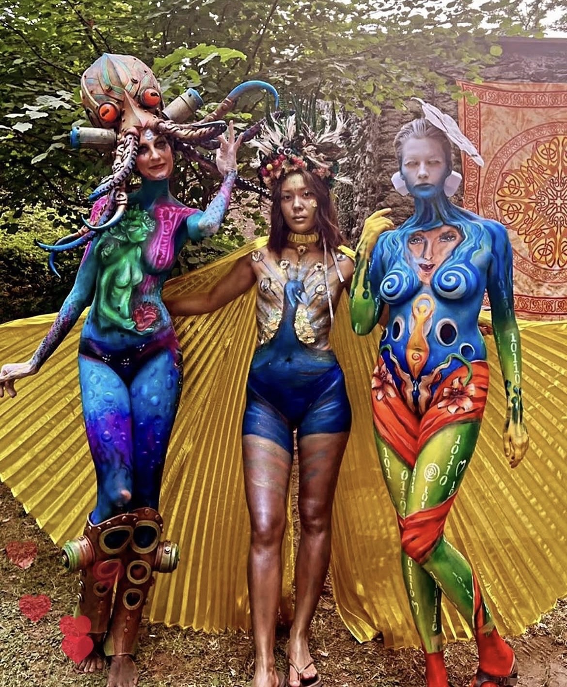 Bodypainting walking act trio at festival